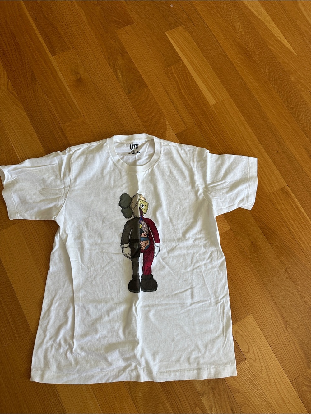 Uniqlo White Short Sleeve Tee with Kaws Split Cartoon Character Graphic